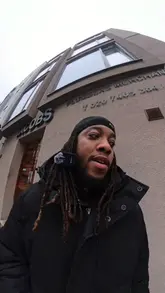 A vlog-style review of a traditional cafe in Farringdon, where the creator tries a pork-free Full English breakfast and discovers 'bubble and squeak' for the first time.