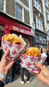 A short, energetic video showcasing a visit to Logma, an Iranian-Iraqi cafe in Hackney. The video highlights the popular queue, the food preparation process, and the final sandwiches, effectively conveying the venue's viral appeal and casual dining experience.