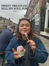 A casual, authentic shot of a person enjoying a scoop of gelato outdoors on a street, likely in Liverpool, used to promote a local sweet treat venue.