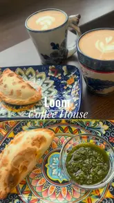 A short, visually appealing reel featuring a visit to Loom Coffee House. The video highlights their Guatemalan coffee, various empanadas, and a white chocolate alfajor, demonstrating the dipping experience. It provides a glimpse of the menu and the cozy interior, effectively communicating the cafe's atmosphere.