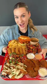 A high-energy review of Wingers in Sittingbourne, featuring a variety of fried chicken dishes, loaded fries, mac and cheese, milkshakes, and chunky cookies.