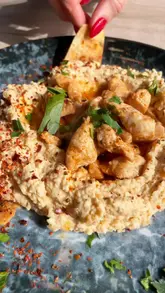 A review of a Turkish restaurant on Bold Street, Liverpool, highlighting their lunch deal, starters like hummus and calamari, and main courses including chicken and lamb kebabs.