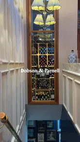 A montage video showcasing the refurbished interior and new small plates menu at Dobson & Parnell in Newcastle. The video features shots of the dining room, wine display, and various plated dishes.
