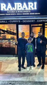 A father and son visit Rajbari Kitchen in Birmingham for a meal, reviewing various dishes including a spicy fish dish, lamb chop curry, and dal.