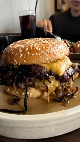 A short, punchy review of a double smash burger and tacos at The Boot Cantina in St Albans, highlighting the food quality and pub atmosphere.