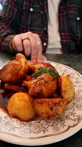 A short montage featuring a roast dinner served at a wine shop and deli, showcasing the food and the venue's interior.