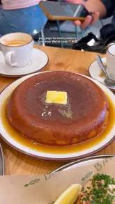 A short, engaging review of Bara Cafe in London, focusing on their signature Welsh honey butter pancake and Pembrokeshire lobster roll. The video uses quick cuts and text overlays to highlight the food and the cafe's unique Welsh identity.