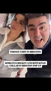 A couple visits a collaboration between Morley's and Roti King in Brixton, documenting their arrival, the queue, the ordering process, and their honest review of the food items, including loaded fries, nasi goreng, wings, and a roti canai chicken wrap.