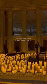 A montage of cinematic shots showcasing a Candlelight Concert event held at St George's Hall, Liverpool, featuring a string quartet performing amidst hundreds of candles.