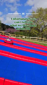 A fast-paced, energetic reel showcasing a family day out at Robin Hill adventure park. The video features a variety of activities including a toboggan run, rope bridges, net climbing, a tractor ride, a boat ride, and a falconry show, highlighting the park's suitability for families and dog owners.