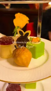 A short, aesthetic montage showcasing an afternoon tea service at Hotel Café Royal in London. The video features close-up shots of themed pastries, the pouring of tea, and the opulent interior of the dining room, set to music with minimal text overlays.