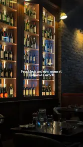 The video provides a tour of the Dobson & Parnell restaurant in Newcastle, highlighting its refreshed interior and new menu. It features a variety of dishes, including small plates, mains, and desserts, presented in an inviting and atmospheric setting.
