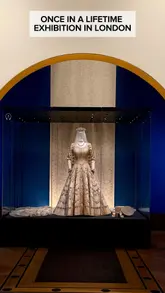 A montage of clips showcasing the 'Queen Elizabeth II: Her Life in Style' exhibition at The King's Gallery, Buckingham Palace, featuring various royal gowns, hats, and accessories.