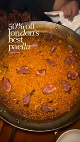 A promotional reel featuring a visit to Arros QD in Fitzrovia, highlighting their Valencian-style wood-fired dishes, specifically the paella, prime rib, octopus, and scallops, while promoting a 50% off offer via First Table.