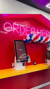 Award-winning Great British Doner restaurant in Manchester with wraps, boxes, and burgers on display.