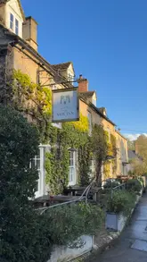A short, atmospheric video showcasing The New Inn, featuring exterior shots, cozy interior scenes, and food items like steak and fries. The video highlights the pub's welcoming environment, including its dog-friendly policy.