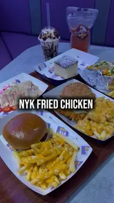 A promotional video for the new menu at NYK Fried Chicken in Bradford, featuring close-up shots of fried chicken burgers, loaded fries, cheesecake, and mocktails.
