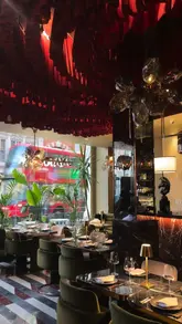 A montage-style video showcasing the interior and food offerings at Yaprak in Knightsbridge. The video features slow-motion shots of various Turkish dishes, including lamb beyti, chicken shish, and king prawns, alongside mocktails and a pineapple creme brulee dessert. The lighting is moody and atmospheric, emphasizing the upscale nature of the venue.