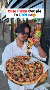 A couple visits D'lite Pizza in East London, showcasing their Indian-style pizzas, including a cheese burst option and stuffed garlic bread. The video highlights the affordability and the 'no onion, no garlic' menu options.