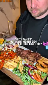 A creator visits 'Carnivore by the Mine' in South Wales, showcasing their meat feast platter and bao buns, highlighting the venue's hidden location and value for money.
