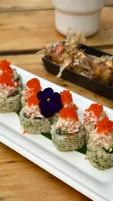 A montage showcasing various food and drink offerings at Goodsheds, including sushi, loaded fries, fried chicken, and cocktails, followed by a brief exterior shot of the venue.