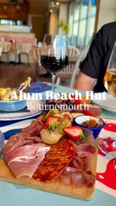 A montage showcasing food and interior at Alum Beach Hut in Bournemouth, featuring a charcuterie board, steak, grilled chicken salad, and dessert.