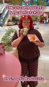 A short, handheld-style video showcasing a visit to Snowflake Gelato. The creator presents a 'snow cob' (sweetcorn-flavoured gelato) and two matcha drinks (coconut cloud and strawberry), providing close-up shots of the products in the display case and in hand.