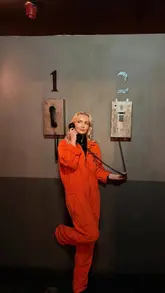 A short, energetic video showcasing a visit to Alcotraz, a prison-themed cocktail bar. The footage highlights the immersive set design, including the mugshot wall, prison cells, and staff in character, alongside the themed cocktails served in tin cans.