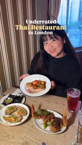 A short review video featuring a creator visiting a Thai restaurant in London, highlighting specific dishes like oysters, crispy pork belly, and a dessert.