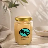 A clean, professional product shot of a jar of sea moss gel, presented in a minimalist, well-lit setting that emphasizes the natural and wellness-focused nature of the product.