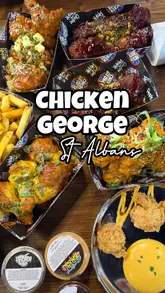 A high-energy promotional video for the opening of Chicken George Jnr in St Albans. The video features a montage of the ribbon-cutting ceremony, close-ups of various chicken wing dishes and sides, the venue's interior with neon signage and gaming screens, and a humorous look at the disco-themed bathroom.