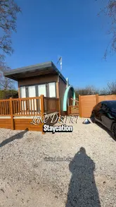 A family vlog documenting a two-night stay at Wild Rose Holiday Park in the Lake District. The video provides a tour of the glamping hive accommodation, highlights the hot tub, swimming pool, and children's play area, and includes snippets of meals eaten during the stay.