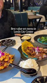 A couple visits Blue Pavilion in Leeds to review their Easter set menu, showcasing the variety of dishes, the restaurant's interior, and the unique robot server.