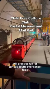 The creator visits the Postal Museum and Mail Rail in London as part of a 'Child Free Culture Club' series, highlighting the experience for adults. The video features a tour of the Mail Rail train ride, the museum exhibits, and the post sorting simulator, providing a clear overview of what to expect.