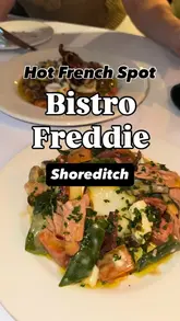 A short video showcasing Bistro Freddie in Shoreditch, featuring shots of the restaurant interior, the menu, and various dishes including steak, monkfish, and salad.