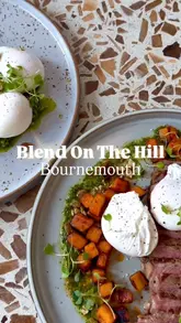 A short, polished montage showcasing brunch dishes and coffee at Blend on the Hill in Bournemouth. The video features close-up shots of steak and eggs and a sweet potato hash, along with latte art and brief glimpses of the cafe interior.