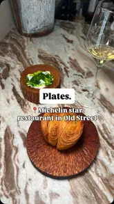 A first-person vlog-style review of a Michelin-starred vegan restaurant in London, showcasing an 11-course tasting menu. The creator walks the viewer through the experience, highlighting the chefs' passion and the unique, creative dishes served.
