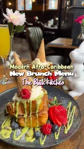 A review of the brunch menu at The Black Kitchen, featuring a variety of dishes including French toast, a breakfast platter, and a breakfast scone. The video uses a vlog-style format with voiceover commentary to highlight the food quality and menu options.