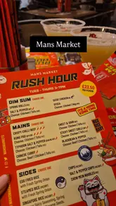 A promotional video for Mans Market highlighting their 'Rush Hour' early bird menu. The video features the creator showcasing the menu, the food, the cocktails, and the interior of the restaurant, providing clear information about the offer's timing and price.