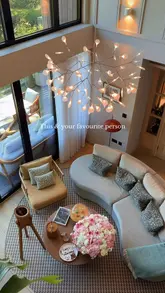 A short, aesthetic montage showcasing a luxury hotel stay, featuring shots of the room, the balcony, the lake view, and a couple relaxing.