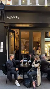 A stylish, well-edited reel showcasing Marjorie's, a Parisian-inspired restaurant and wine bar in Soho. The video features a montage of the venue's intimate interior, staff preparing drinks, and close-ups of various seasonal French dishes, effectively communicating the relaxed yet sophisticated atmosphere.