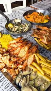 A creator visits Ocean Basket in Kingston Upon Thames to showcase their affordable seafood menu, featuring dishes like the Seafood Trio and Royal Wave Platter. The video highlights the Mediterranean-inspired food, the waterside location, and the value for money, encouraging viewers to visit before the offer ends.