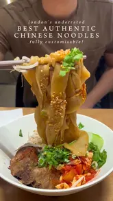 A short, punchy video showcasing various noodle dishes, a shrimp starter, and a dessert at Super Bowl Noodle Bar in London. The video uses close-up shots of the food, including noodle pulls, to highlight texture and presentation, accompanied by text overlays describing the dishes.