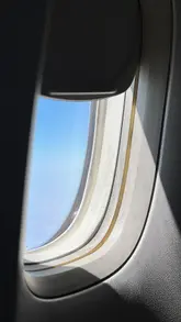 A fast-paced, rhythmic montage of luxury travel experiences, including plane travel, poolside lounging, yachting, and fine dining. The video uses a consistent 'I'm kinda busy' text overlay to frame the content as a celebration or getaway, likely a hen weekend.