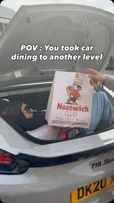 A high-energy, vlog-style reel showcasing a visit to Naanwich Club in Manchester, highlighting their viral butter chicken sauce, pizzas, naan wraps, and loaded fries, with a fun 'car dining' concept.