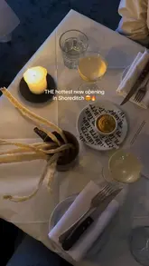 A short, punchy reel showcasing the interior, drinks, and various dishes at a new British bistro in Shoreditch, emphasizing the high-quality presentation and the connection to a Michelin-starred team.