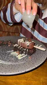 A review video of Rasoi Indian Kitchen, showcasing the restaurant's interior, menu, and a variety of Indian dishes including starters, mains, and desserts.
