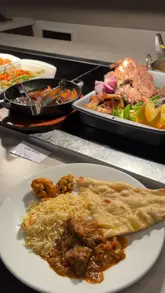 A detailed walkthrough of Aura Buffet in Paisley, showcasing the various food stations including Italian, Chinese, Indian, and a dedicated dessert area. The creator provides a tour of the venue, highlighting the Sunday roast options and the dessert selection, while sharing their personal experience with the food.