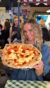 A promotional vlog-style video showcasing the launch night of the new Pizza Pilgrims venue in Glasgow, featuring various pizzas, sides, drinks, and the lively atmosphere.