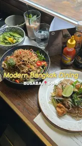 A vlog-style review of a visit to Busaba in Soho, featuring a variety of Thai dishes and drinks, highlighting the sharing-style menu and the restaurant's atmosphere.